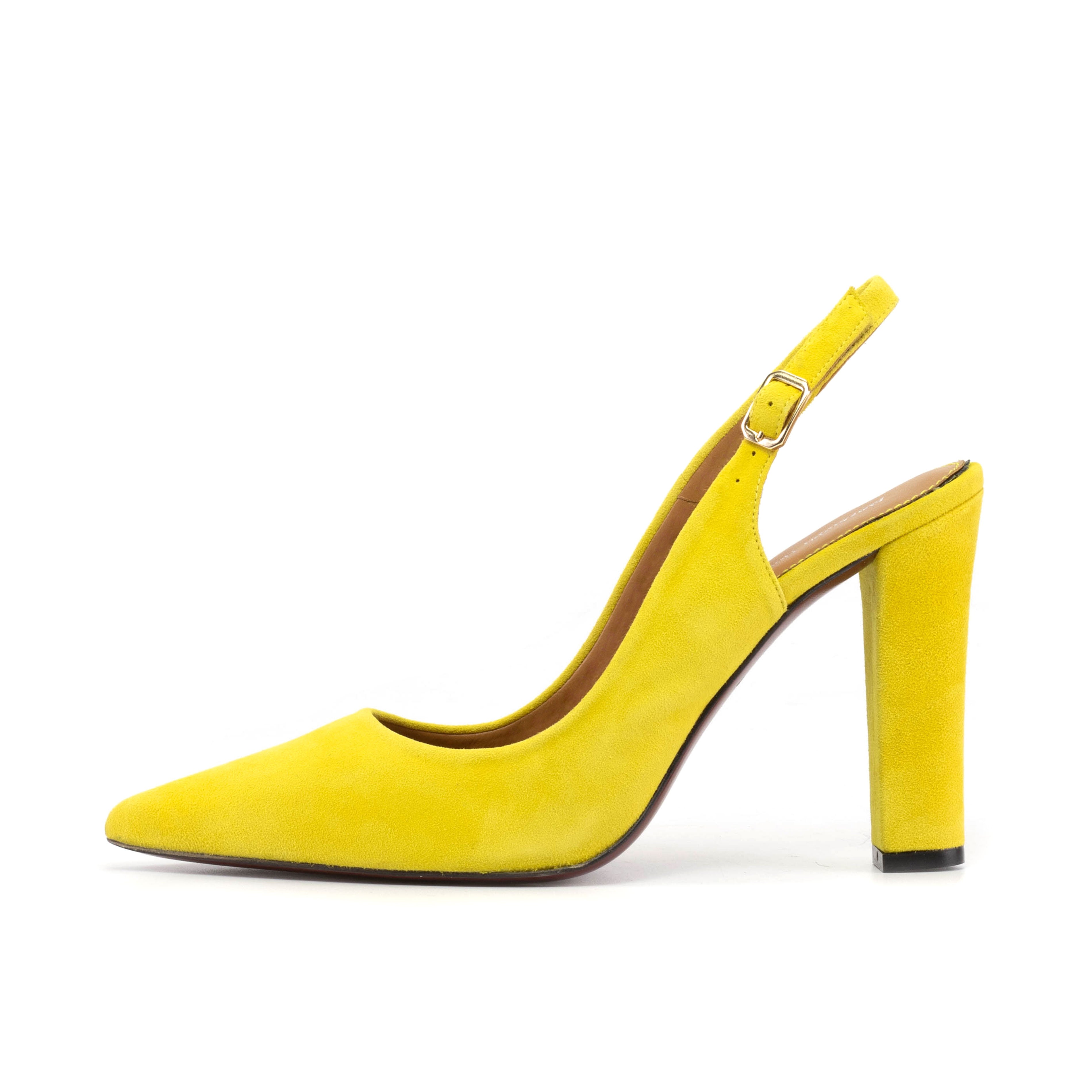Premium Photo | Beautiful female legs in yellow snake skin high heels shoes